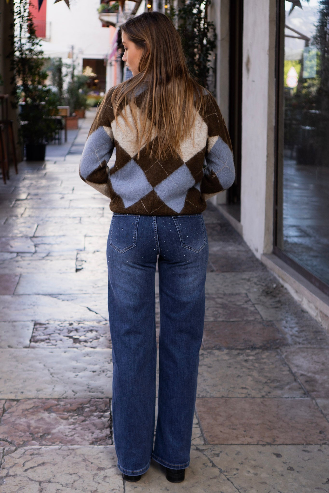 JEANS DRITTI CON BRILLANTINI